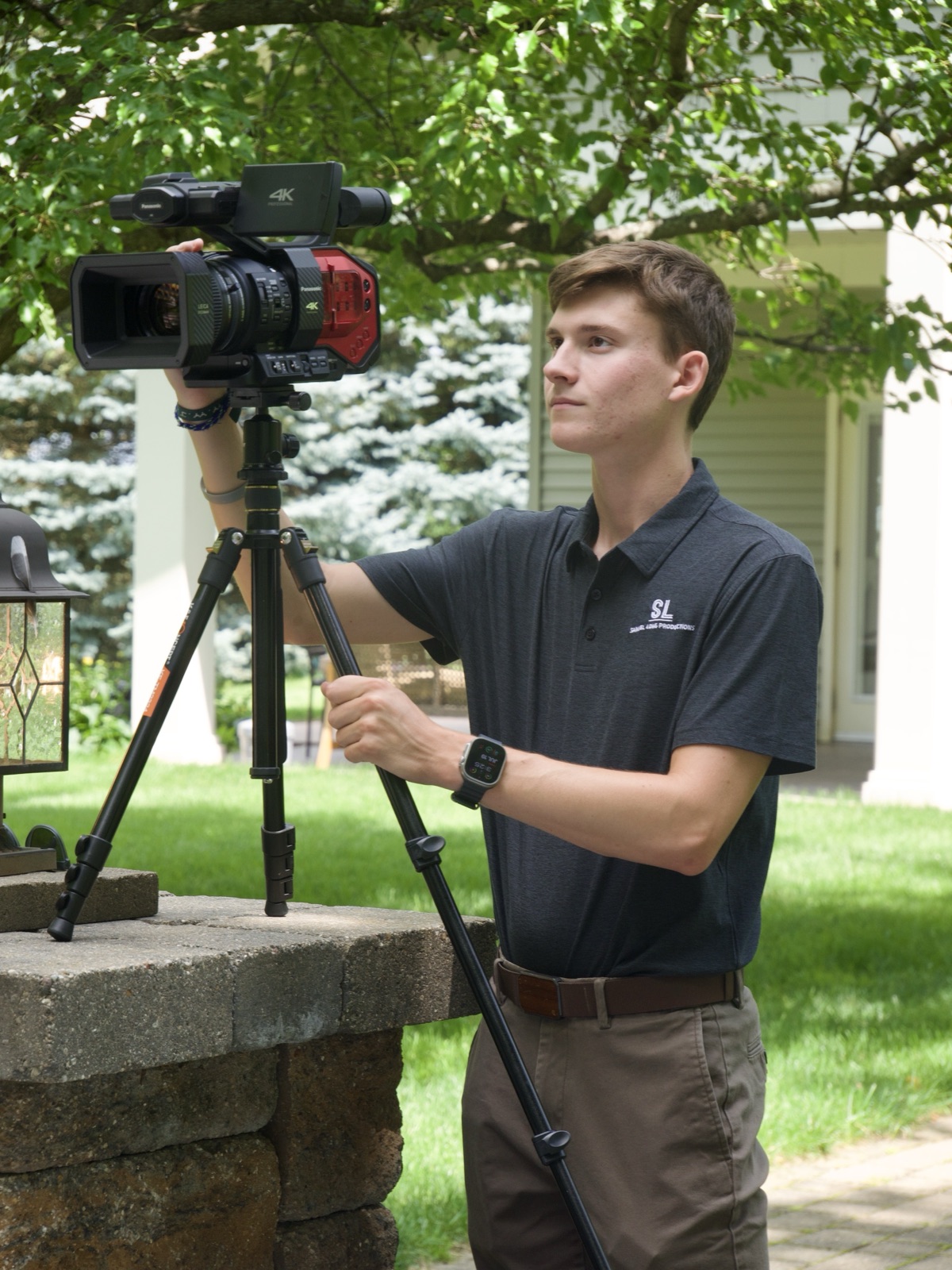 Samuel Long operating a cinema camera on a shoot