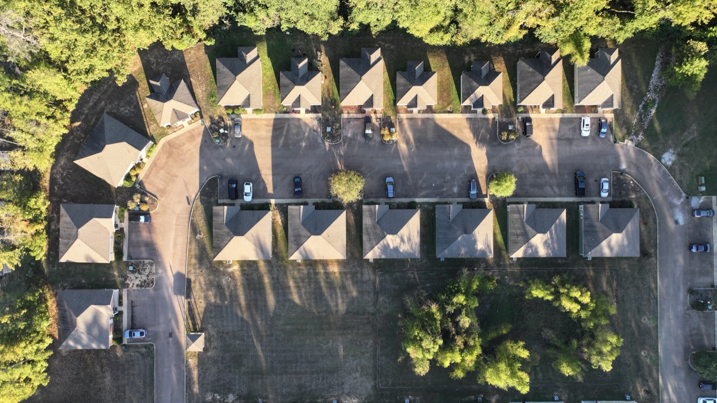 Drone aerial straight down over the Acadia Loop row houses in Oxford, Mississippi, FAA Part 107 real estate photography