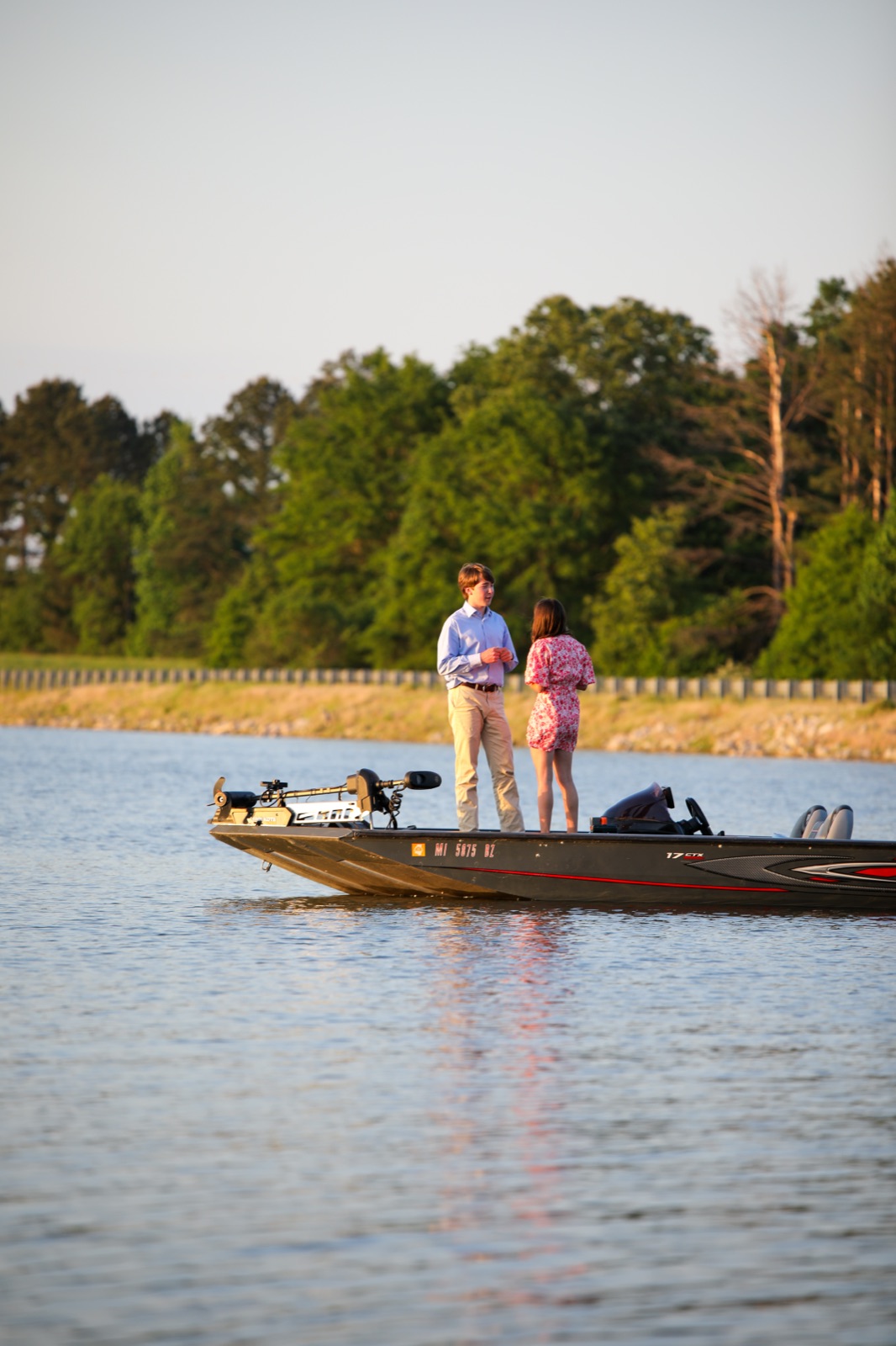 Golden-hour proposal on the lake