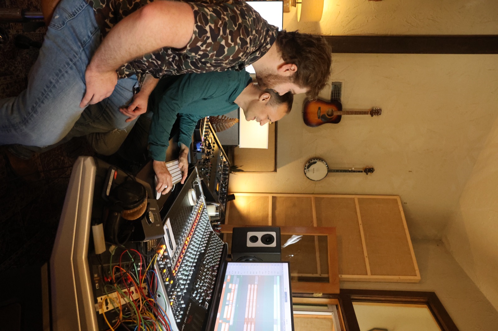 Behind the board in the studio