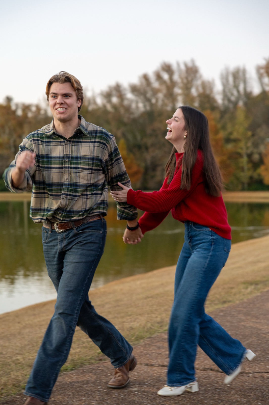 Couple walking the lakeside trail