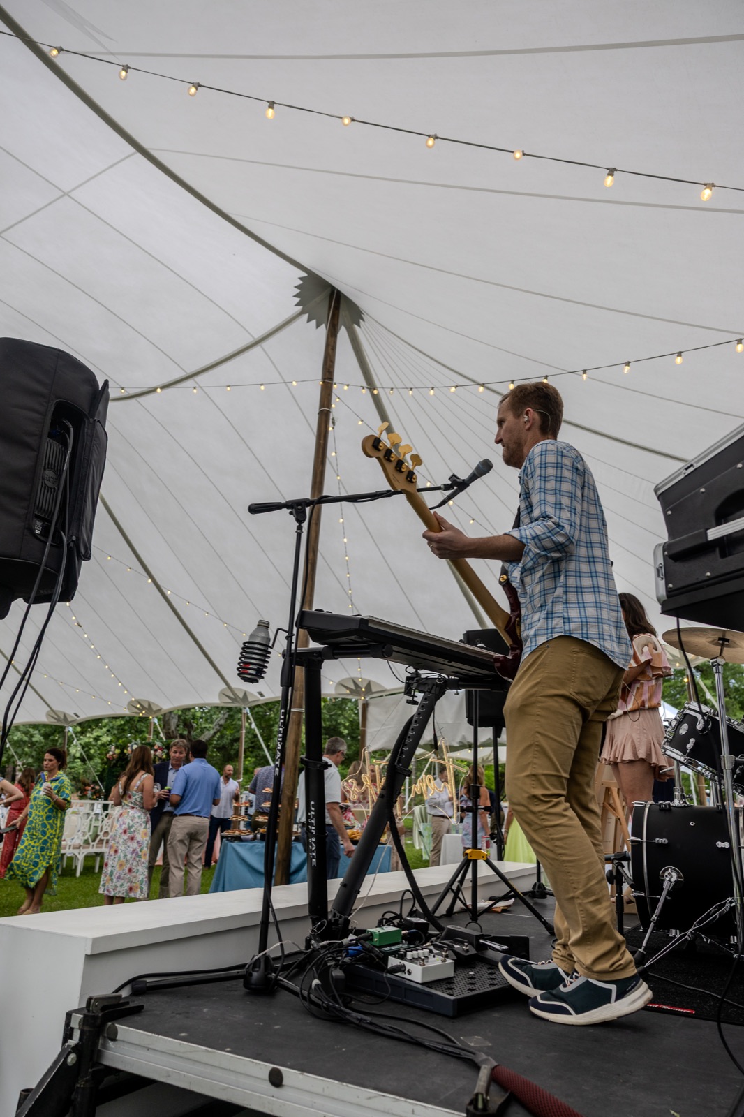 Live band under a tent at a corporate garden party